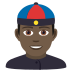 👲🏿 person with skullcap: dark skin tone display on JoyPixels